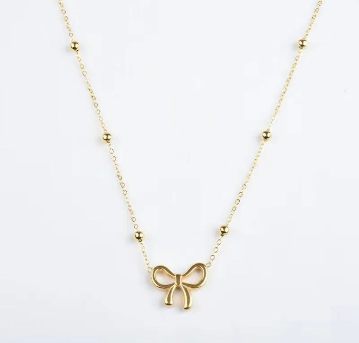 The Bow Pendant Necklace