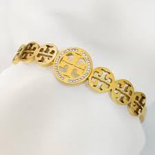 Elegant Gold Plated Emblem Bracelet – Luxury Statement Jewelry for Women