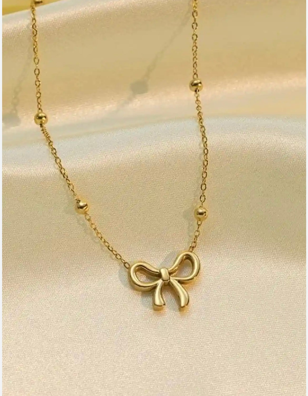 The Bow Pendant Necklace